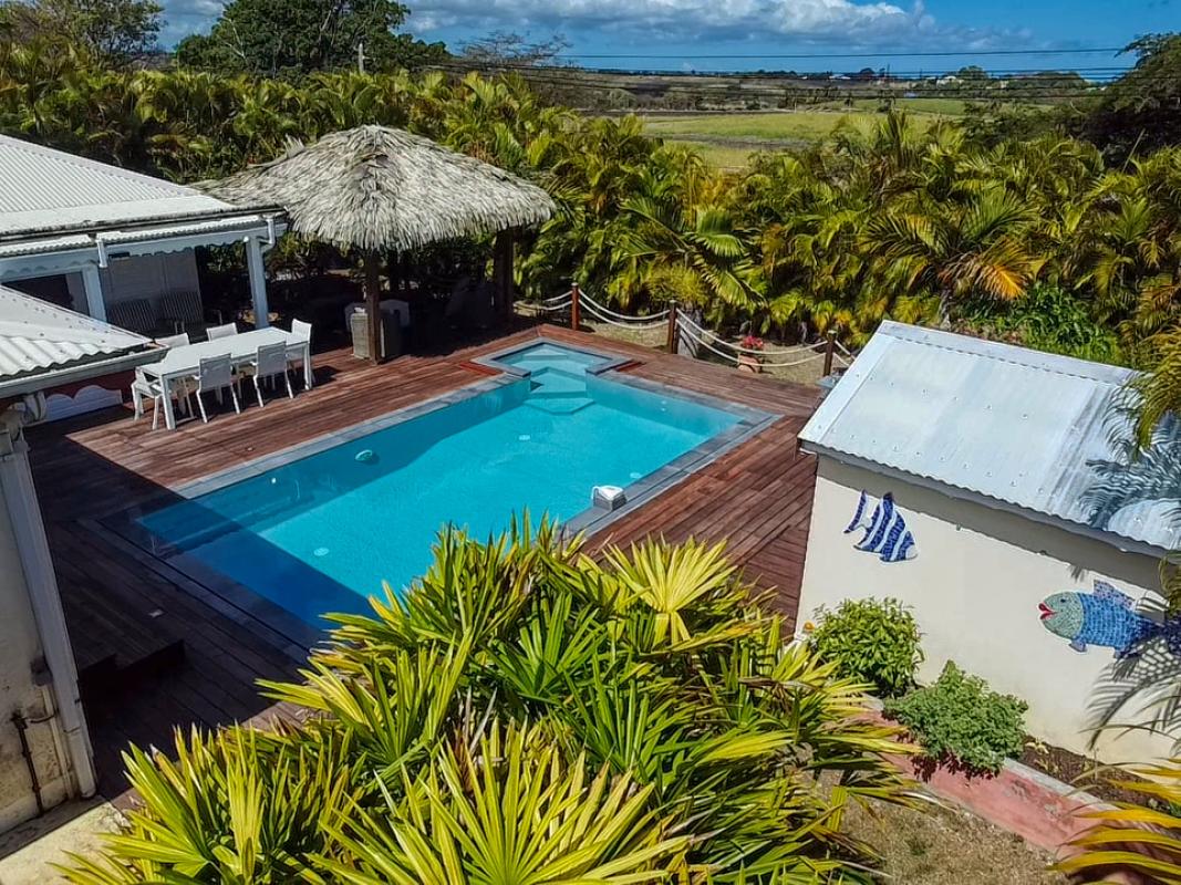 Location villa 4 chambres 11 personnes avec piscine à St François en Guadeloupe - vue d'ensemble.